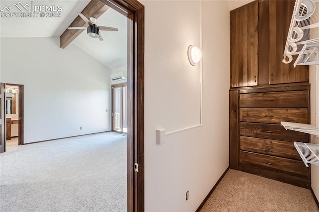 corridor with light carpet, vaulted ceiling with beams, and baseboards