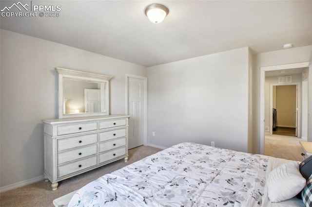 bedroom featuring light carpet, baseboards, and visible vents