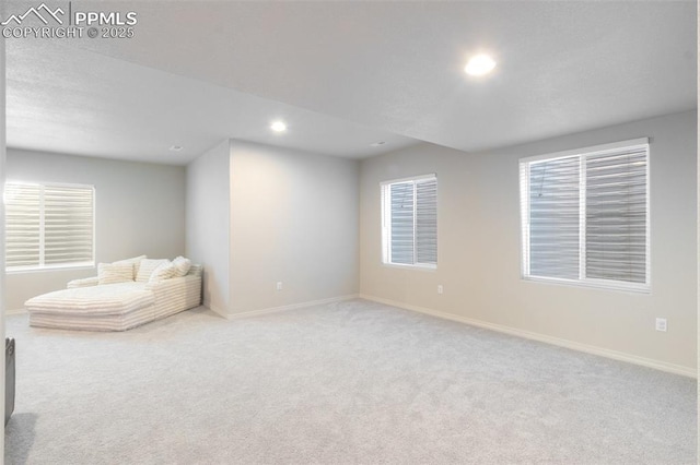 unfurnished room featuring recessed lighting, carpet flooring, and baseboards