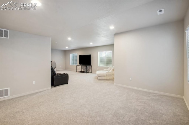 unfurnished room with visible vents, carpet flooring, and recessed lighting