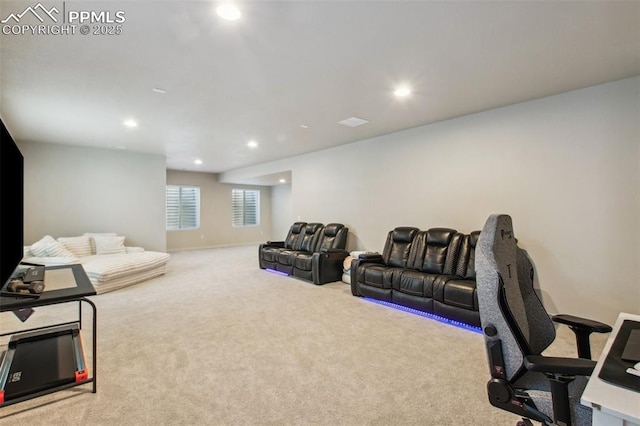 living area featuring carpet flooring and recessed lighting