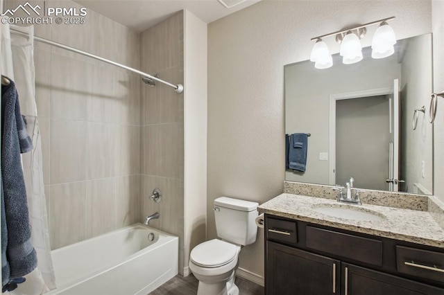 bathroom featuring toilet, tub / shower combination, and vanity