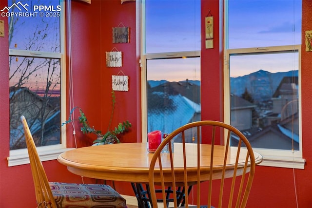 dining space with a mountain view