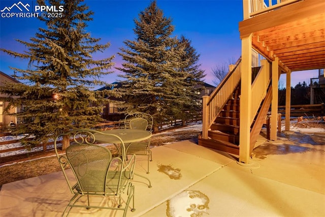 view of patio / terrace with stairway and outdoor dining space