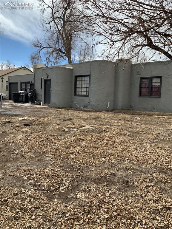 exterior space featuring stucco siding