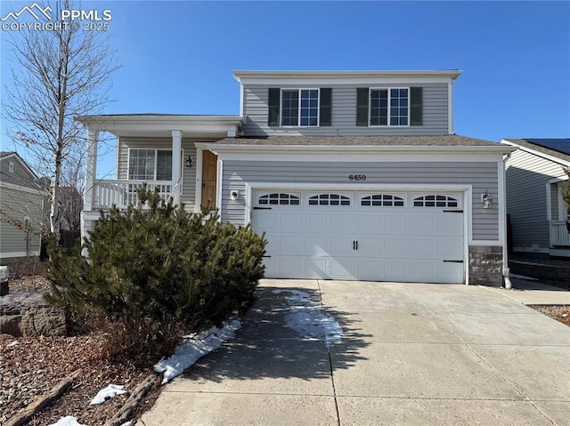 view of front of property with a garage and driveway