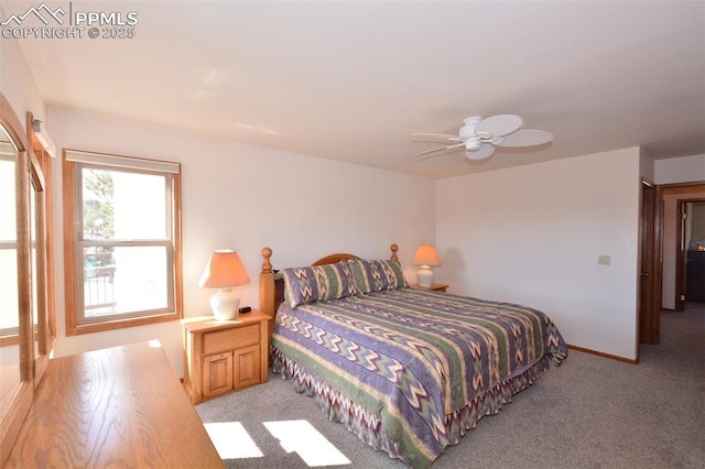 bedroom with baseboards, a ceiling fan, and light colored carpet