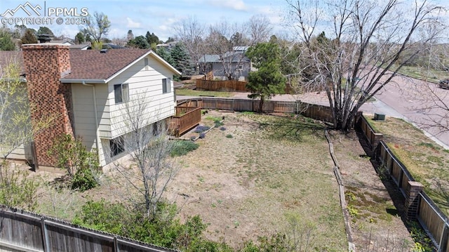 view of yard featuring a fenced backyard