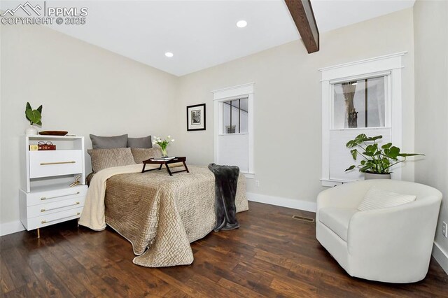 bedroom featuring recessed lighting, beam ceiling, baseboards, and wood finished floors