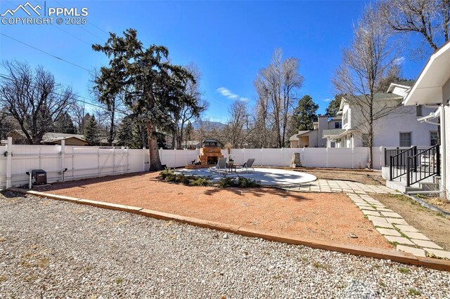 view of yard featuring a fenced backyard and a patio