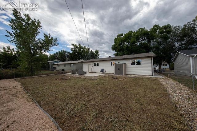 back of house featuring a patio and fence