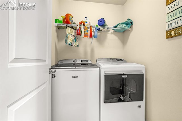 laundry room with laundry area and separate washer and dryer