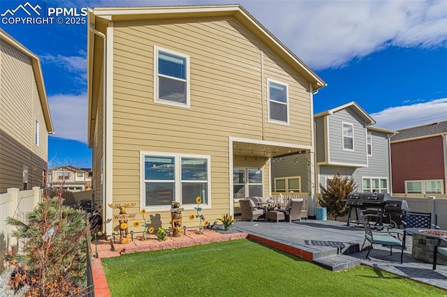 rear view of property featuring an outdoor living space with a fire pit, fence, a lawn, and a patio