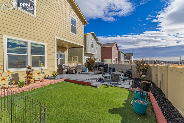 exterior space featuring an outdoor hangout area, a patio, a fenced backyard, and a residential view