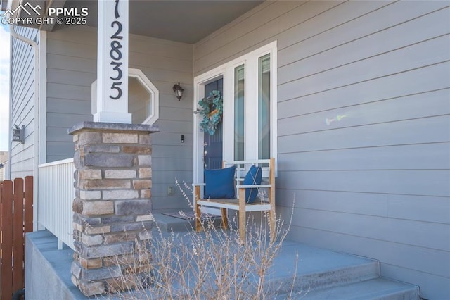 doorway to property with covered porch