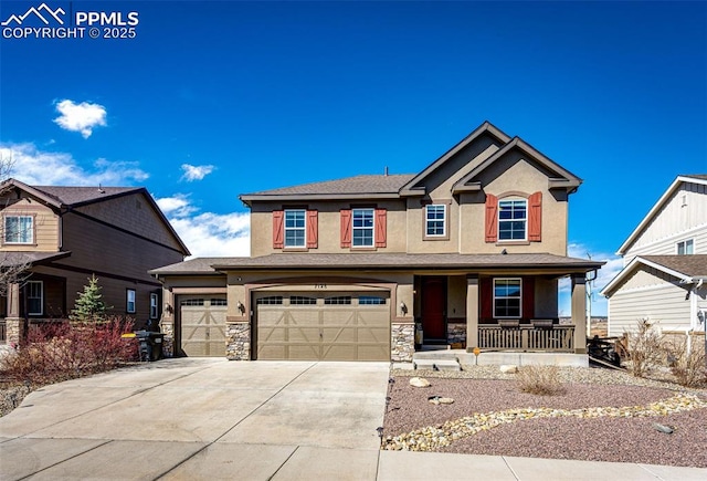 view of front facade with stucco siding, a porch, an attached garage, stone siding, and driveway