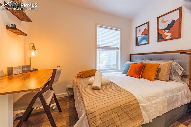 bedroom featuring baseboards