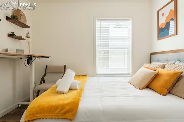 bedroom featuring baseboards