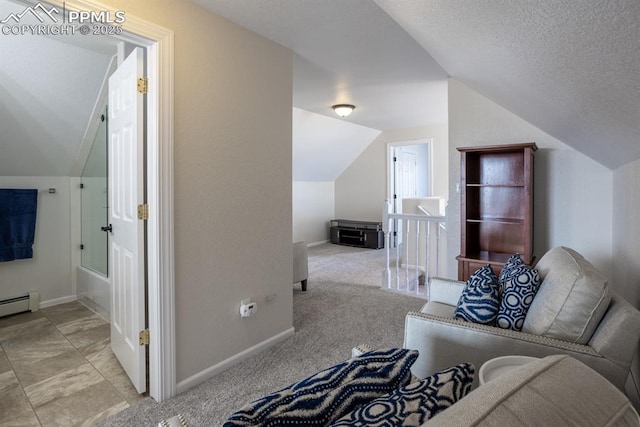 additional living space featuring carpet floors, lofted ceiling, a textured ceiling, and baseboards