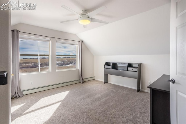 bonus room featuring carpet, a baseboard heating unit, a ceiling fan, vaulted ceiling, and baseboards