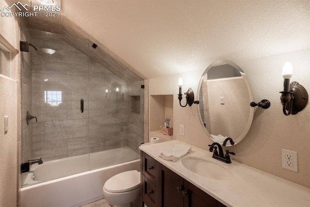 bathroom with toilet, enclosed tub / shower combo, vaulted ceiling, and vanity