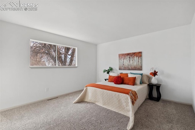 carpeted bedroom with visible vents