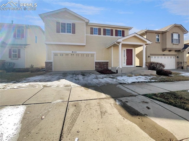 view of front of house featuring driveway and an attached garage