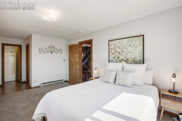 carpeted bedroom featuring baseboards and baseboard heating