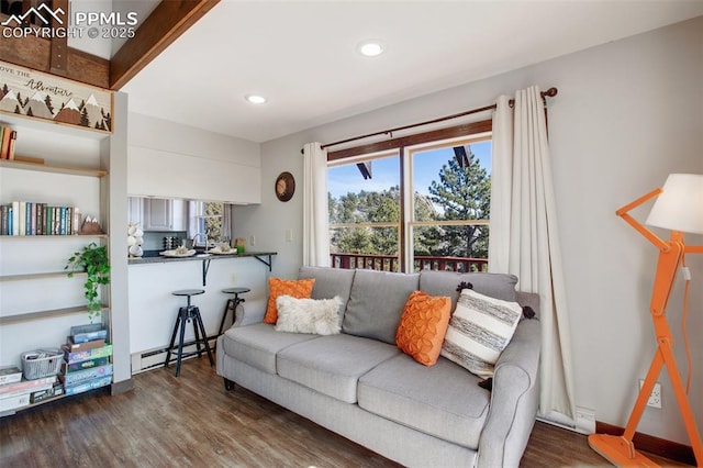 living area with a baseboard heating unit, baseboards, dark wood finished floors, and recessed lighting