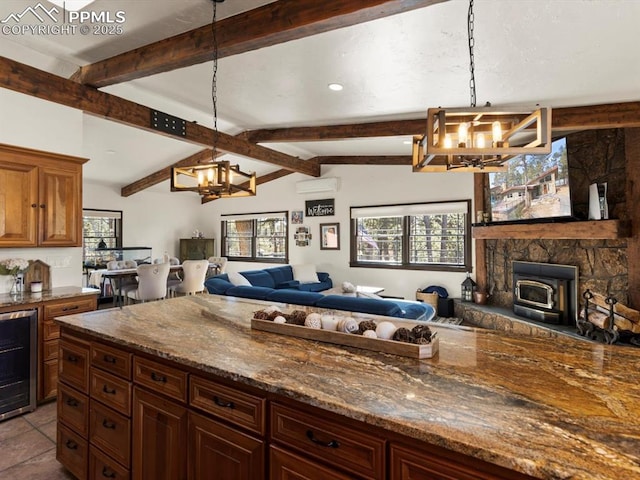 kitchen with beverage cooler, a wall unit AC, open floor plan, vaulted ceiling with beams, and an inviting chandelier