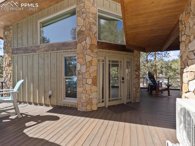 wooden terrace with ac unit