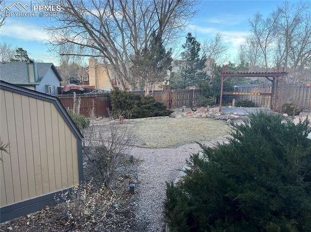 view of yard with a fenced backyard