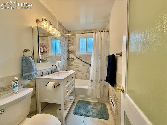 bathroom featuring visible vents, shower / bath combo, vanity, and toilet