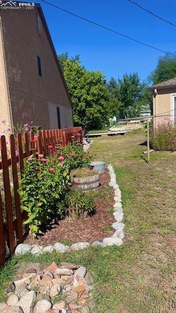 view of yard with fence