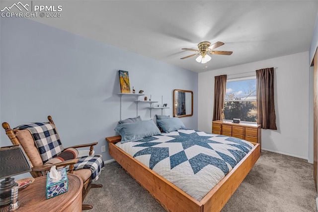 bedroom with carpet flooring, a ceiling fan, and baseboards