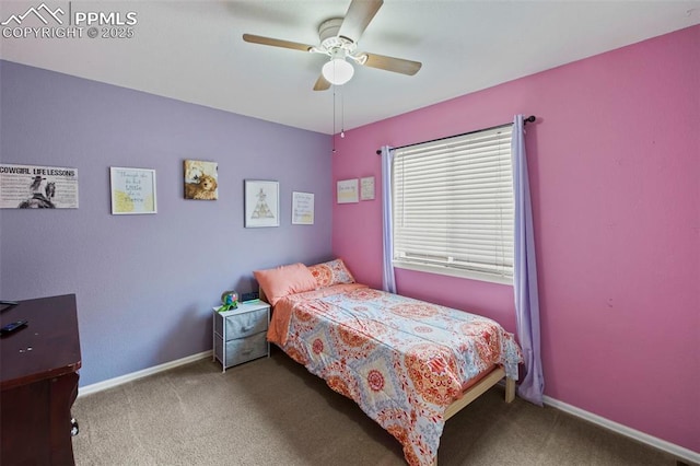 carpeted bedroom with a ceiling fan and baseboards