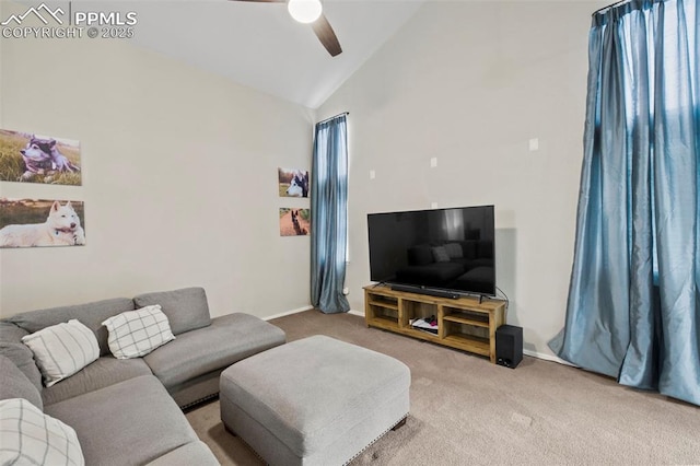 living area with ceiling fan, high vaulted ceiling, carpet flooring, and baseboards