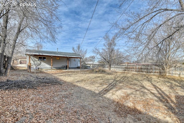 view of yard featuring a patio area and fence