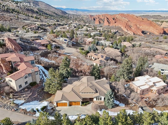 birds eye view of property featuring a residential view and a mountain view