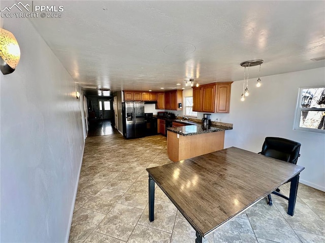 dining space with baseboards