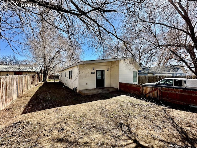 exterior space featuring a fenced backyard