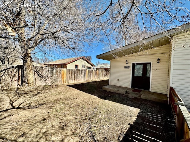 exterior space featuring fence