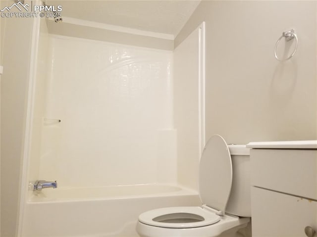 bathroom featuring toilet and bathing tub / shower combination