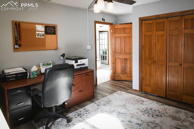 office space with dark wood-style floors and a ceiling fan