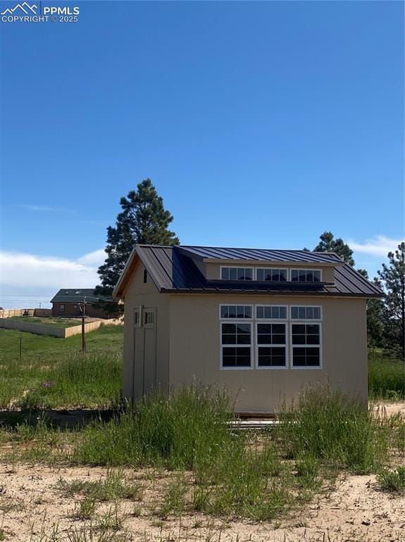 exterior space with a standing seam roof and metal roof