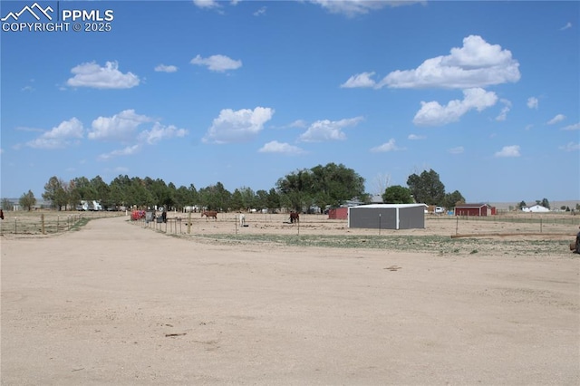 view of yard featuring a rural view