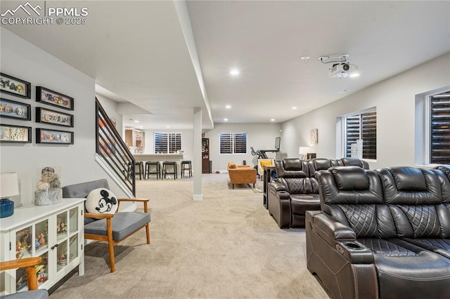 home theater room featuring recessed lighting and light colored carpet