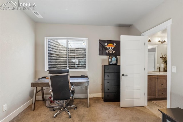 carpeted home office with baseboards and visible vents