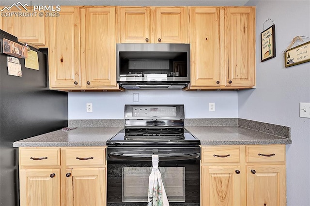 kitchen featuring black appliances and light brown cabinets