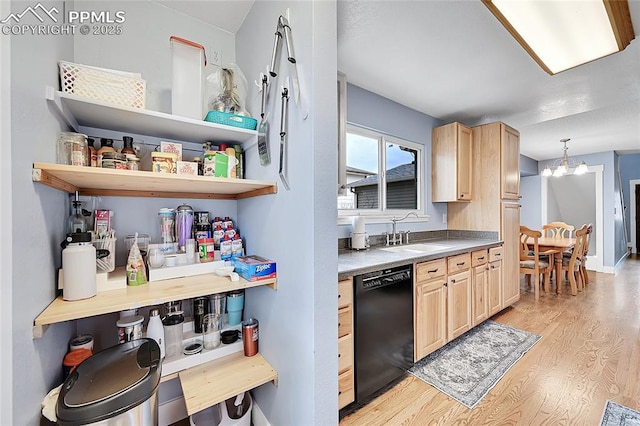 kitchen featuring light wood-type flooring, light brown cabinetry, a sink, an inviting chandelier, and dishwasher